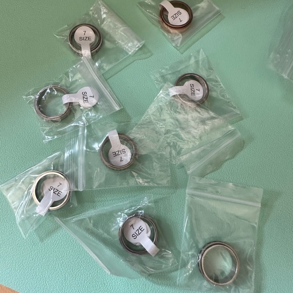 8 spinner rings size 7 - Picture 1 of 3